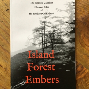 Book cover with photo of sparse trees in fog or smoke